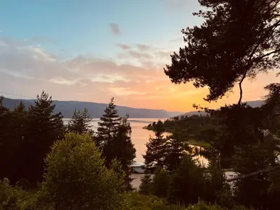 a view of a body of water at sunset at Villa Siesta Dospat in Dospat