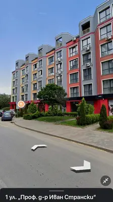 a large building on the side of a street at Romantic Studio in Sofia