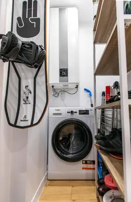a washer and dryer in a small room at Modern Mountain Getaway in Bansko