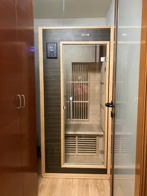 a glass door to a cage in a elevator at Charming Flat in Bansko with Sauna by Flat Mаnager in Bansko