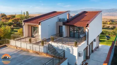 an aerial view of a house with a balcony at Къща за гости Давиос in Sapareva Banya