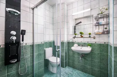 a bathroom with a toilet and a sink at Free Parking And Parliament Is 1 Step Away in Sofia