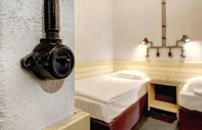 a room with a room with a bed and a lamp at Art Hotel 158 in Sofia
