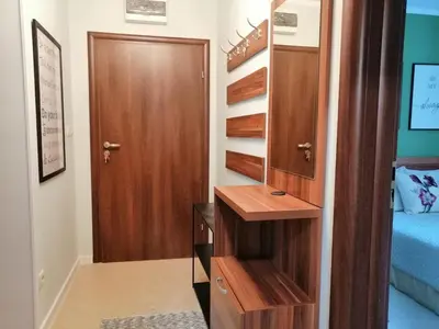 a room with a closet with a desk and a door at Утро без Аларма, Смолянски езера. Alarm free Morning Smolyan lakes in Smolyan