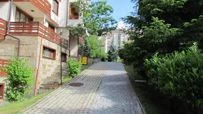 an empty street in a city with buildings at St Ivan Rilski Free SPA Luxury Apartment Bansko in Bansko