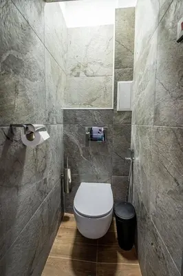 a bathroom with a toilet and a sink at Vitoshka's Finest in Sofia