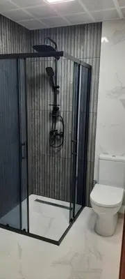 a shower in a bathroom with a toilet at Zora in Blagoevgrad