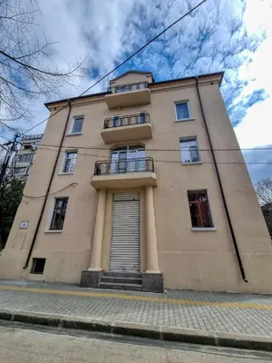 a tall building with a staircase in front of it at Relaxing Studio in Sofia Center in Sofia