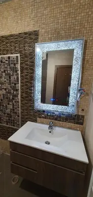 a bathroom with a sink and a mirror at Harriet Hill Designer Bansko in Bansko