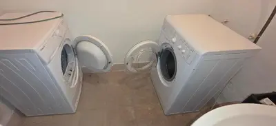 two washing machines and a toilet in a bathroom at Harriet Hill Designer Bansko in Bansko