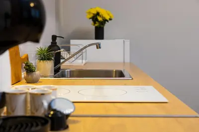a kitchen counter top with a sink and a counter top at Private House in the Center of Plovdiv in Plovdiv