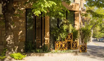 a building with an open door with a dog in it at Hidden Bank: Pearls in Plovdiv