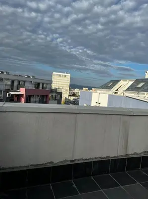 a view of a city from the roof of a building at Little Jack With Terrace in Sofia