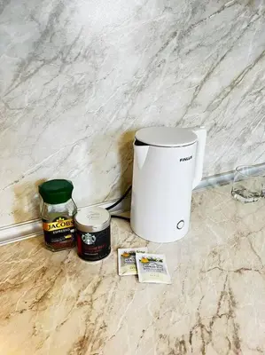 a coffee maker sitting on top of a counter at Little Jack With Terrace in Sofia